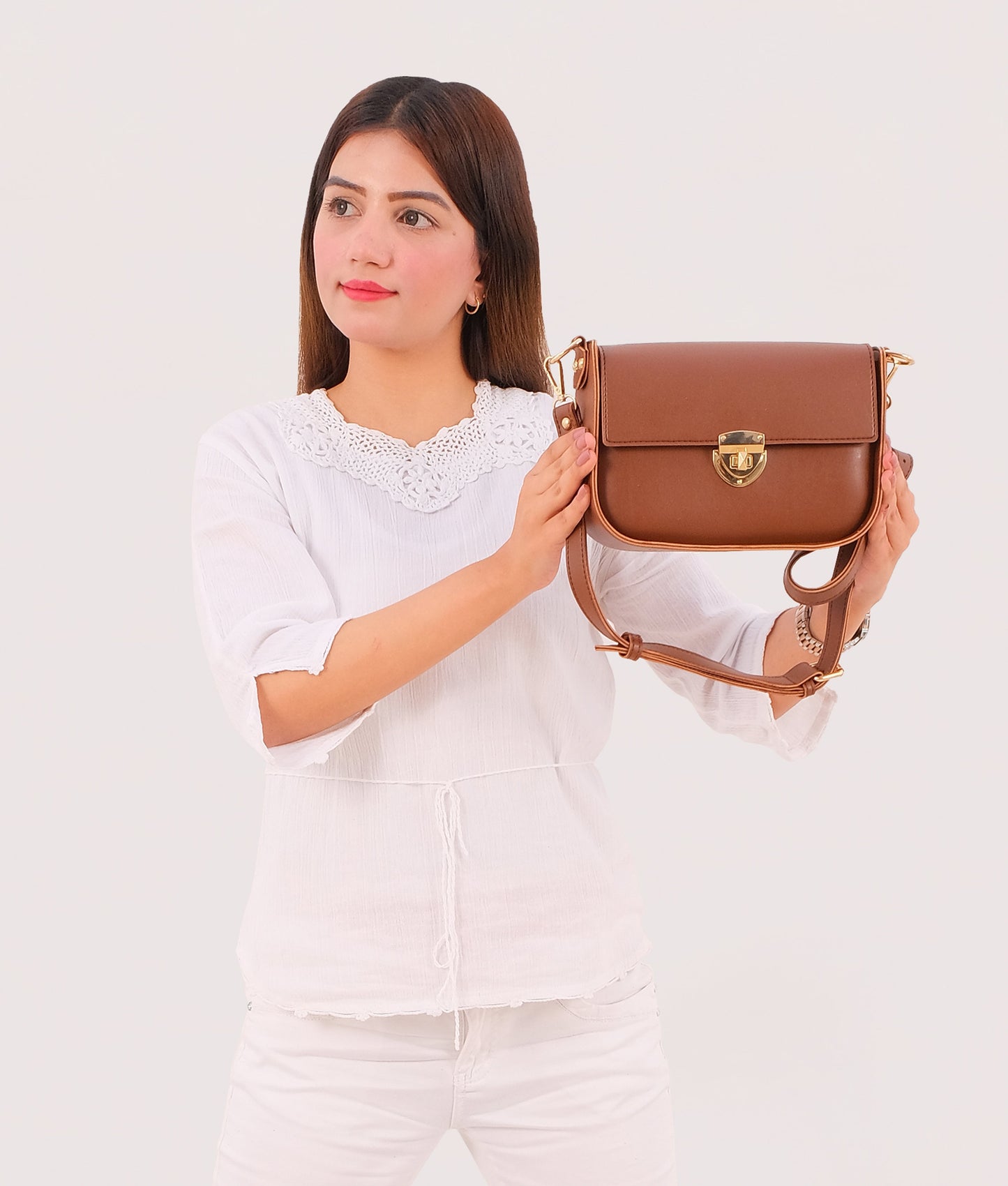 Brown saddle bag with twist lock