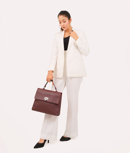 Burgundy flap-over top-handle bag