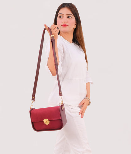 Burgundy suede saddle bag with twist lock